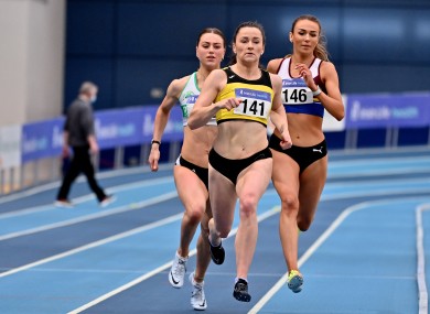 Phil Healy of Bandon AC, Cork, centre, on her way to winning the Women's 400m, with a PB of 51.99.