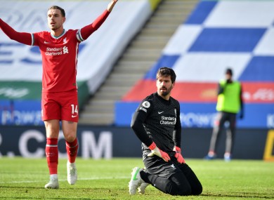 A dejected Alisson as Jordan Henderson appeals in vain after the concession of a goal.