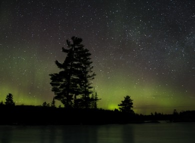 The aurora borealis, or northern lights, make a rare appearance over central Ontario, Canada.