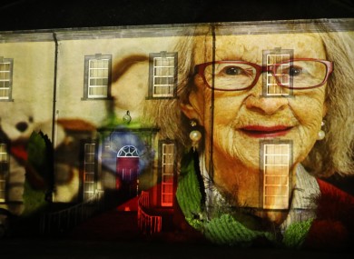 A portrait of survivor Peggy O'Kelly is projected onto Sean Ross Abbey as part of the Herstory Light Show to celebrate St Brigid's Day in February (file photo).