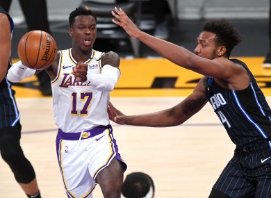 Dennis Scroder of the LA Lakers and Orlando Magic guard Karim Mane.