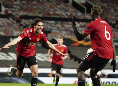 Manchester United's Edinson Cavani, left, celebrates.