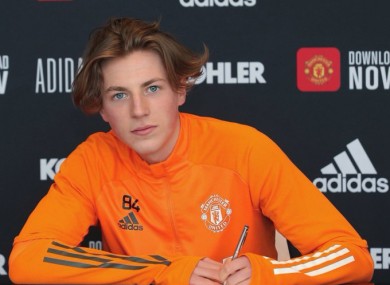 Charlie Savage signs a professional contract with Manchester United.