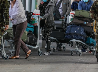 Defence Forces escorting high-risk travellers to hotel quarantine.