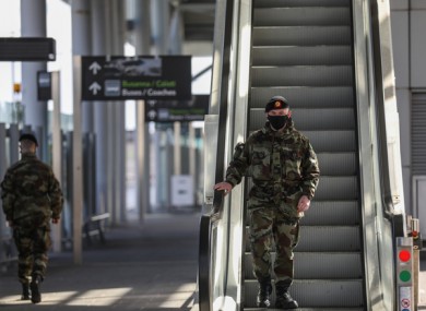Members of the Irish Defence Forces wearing face masks outside Terminal 2 in Dublin Airport last week.
