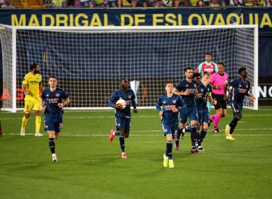 Arsenal players after their goal provided them with a badly-needed boost.