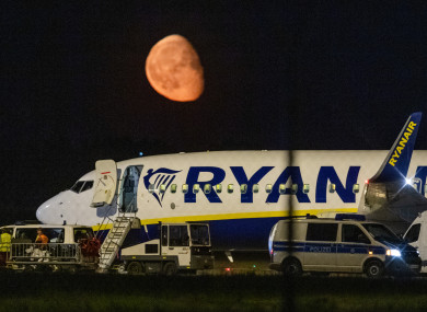 German police examine the Ryanair passenger jet at Berlin Airport.