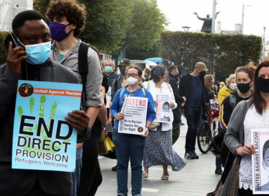 Protesters wearing face masks during an anti-racism demonstration in Dublin last year.