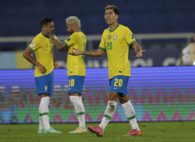Roberto Firmino after scoring Brazil's opener.