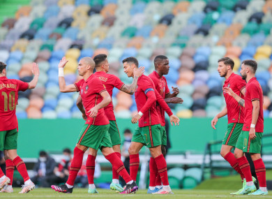 Portugal celebrate after Ronaldo's goal.