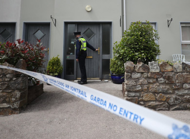 A garda at the scene in Clashmore.
