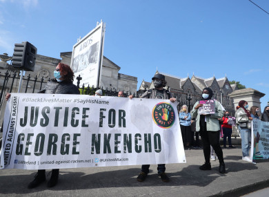 Protesters outside the RDS in Dublin as the inquest opens for George Nkencho.