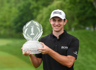 Patrick Cantlay celebrates winning.