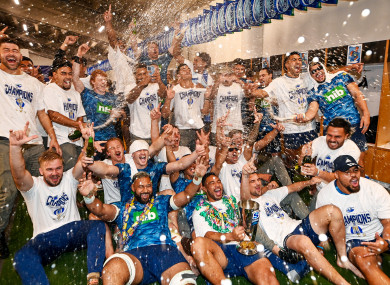 The Blues players celebrate after the game in the dressing room.