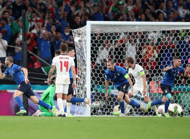 Italy players celebrate Bonucci's equaliser.