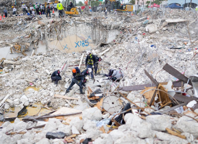 Rescue teams working at the residential building collapse site last week.