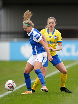 Ruesha Littlejohn under pressure from Ireland team-mate Megan Connolly while making her Birmingham City debut against Brighton & Hove Albion.