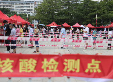 Residents line up for Covid-19 test at a testing site in Xiamen, southeast China's Fujian Province,