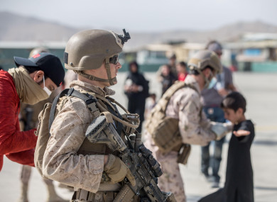 A US marine provides security during evacuation flights at Hamid Karzai International Airport at the weekend.