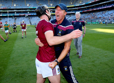 Shane O'Brien celebrating the Joe McDonagh Cup win with Aonghus Clarke.