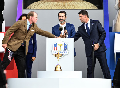 Team captains Steve Stricker and Pádraig Harrington shake hands at Thursday's opening ceremony.