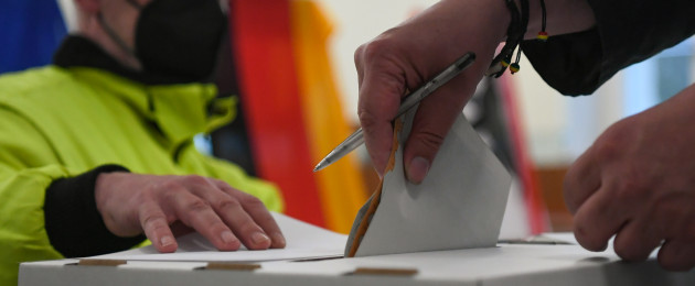 A man casts his ballot in Germany's general election at a polling station in Berlin today.
