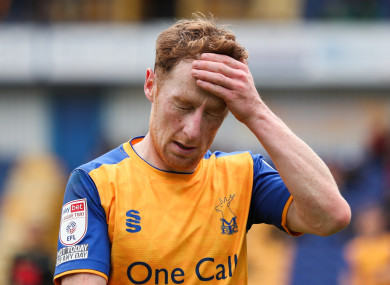 Mansfield Town's Stephen Quinn reacts after being sent off during a 3-1 defeat to Harrogate Town.
