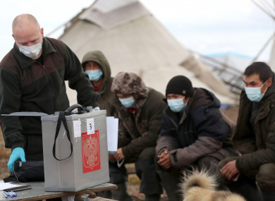 Locals take part in early voting near the village of Karataika in Nenets Autonomous Area in far northern Russia.