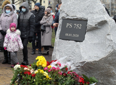 Relatives attending a ceremony held in memory of the victims of flight PS752 on the first anniversary of the plane crash in January 2021.