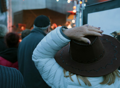 File image of a woman wearing a cowboy hat at a concert.
