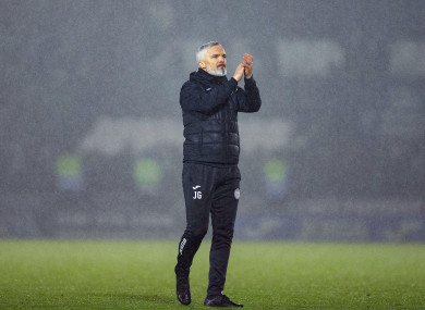 St Mirren manager Jim Goodwin applauds the home supporters.