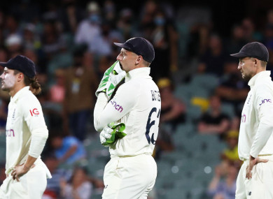 England's Jos Buttler reacts after dropping a chance to dismiss Australia's Marnus Labuschagne.