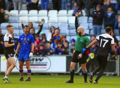 Referee Brendan Cawley sends off Aidan Branagan.