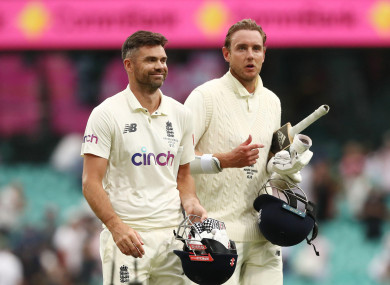 England's James Anderson and Stuart Broad celebrate after earning a draw during day five of the fourth Ashes Test.