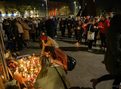 People gathering at a vigil in Galway to pay their respects for Tullamore murder victim Ashling Murphy.
