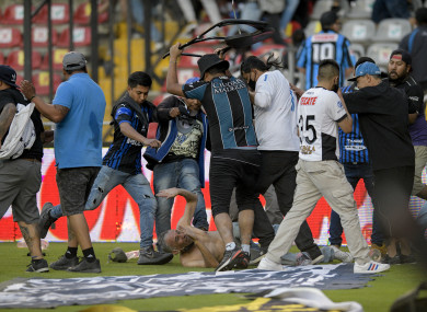 There were chaotic scenes in the stands which spilled onto the pitch.