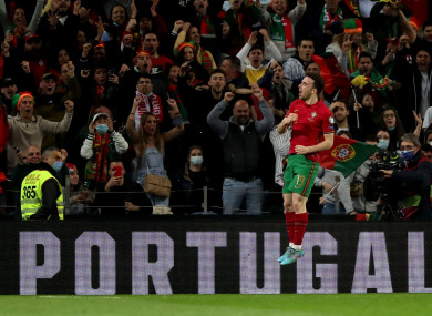 Portugal's forward Diogo Jota celebrates after scoring a goal.