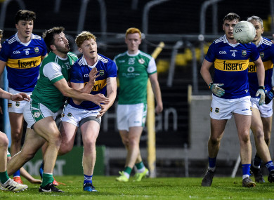 Tipperary's Stephen Quirke with James Gallagher of London.
