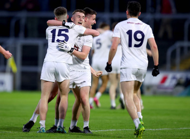 Kildare players celebrate at full-time.
