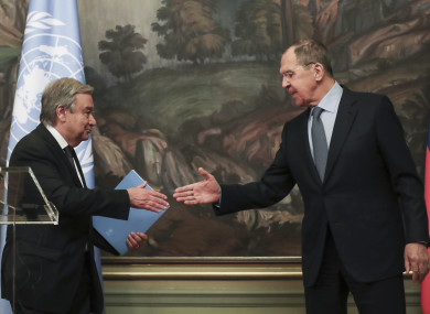 Russian Foreign Minister Sergey Lavrov, right, and UN Secretary-General Antonio Guterres shake hands during their meeting in Moscow