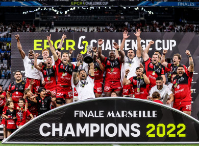 Lyon's Jordan Taufua lifts the trophy for Lyon as European Challenge Cup champions.