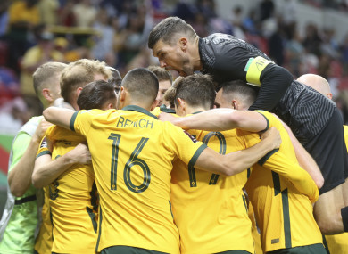 Australia players celebrate.