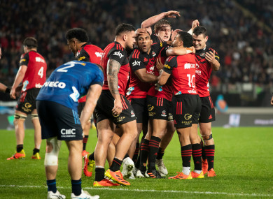 Crusaders celebrate a Bryn Hall try.