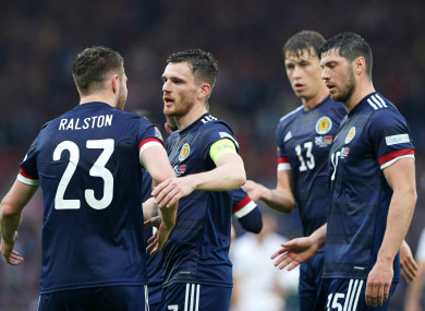 Scotland players celebrate Anthony Ralston's goal.