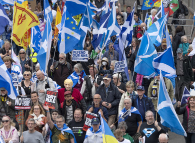 Scottish independence supporters march through Glasgow