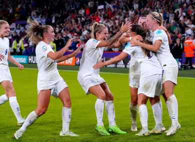 England players celebrate after team-mate Fran Kirby scores their side's fourth goal of the game.