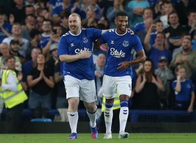 Everton's Mason Holgate celebrates the goal of fund raiser Paul Stratton.