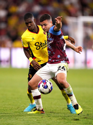 Watford's Yaser Asprilla (left) and Burnley's Josh Cullen battle for the ball.