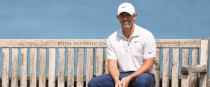 Rory McIlroy takes a break at the sixth tee. 