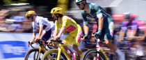 Ben Healy, centre, retained the yellow jersey on Wednesday.